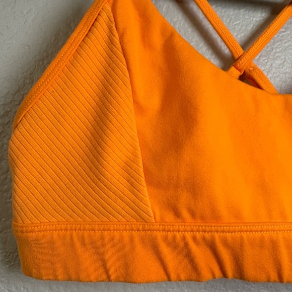 ALO Yoga No Limit Orange Sports Bra with Cross-Back Design. Adjustable Straps - Picture 4 of 12